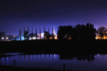 A night photo of the Mudgee Skyline and reflection