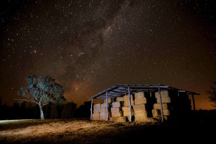 A photo of the Milky Way and old hay shed. Photo by Amber Hooper.